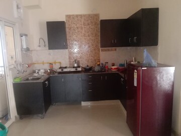 Kitchen in 3 BHK Apartment at Aims Golf City, Sector 75 – for Rent