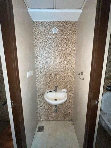 Bathroom in 1 BHK Apartment at Lodha Palava City Lakeshore Greens, Dombivli East – for Rent