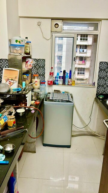 Kitchen in 1 BHK Apartment at Lodha Amara, Kolshet Road – for Sale