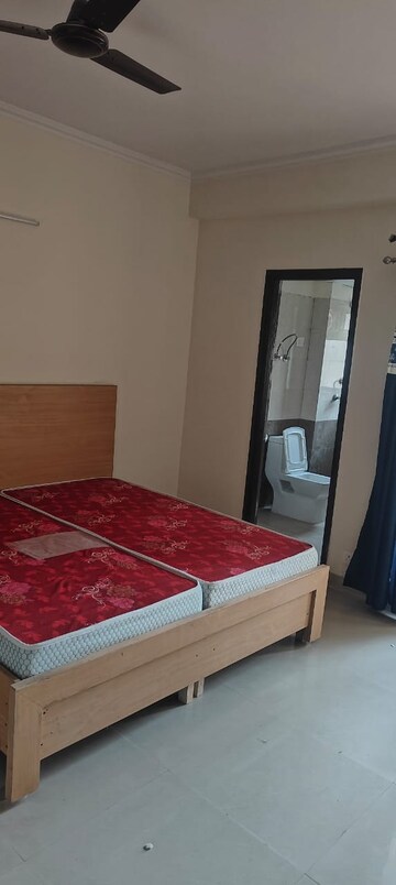 Bedroom in 3.5 BHK Apartment at Aims Golf City, Sector 75 – for Rent