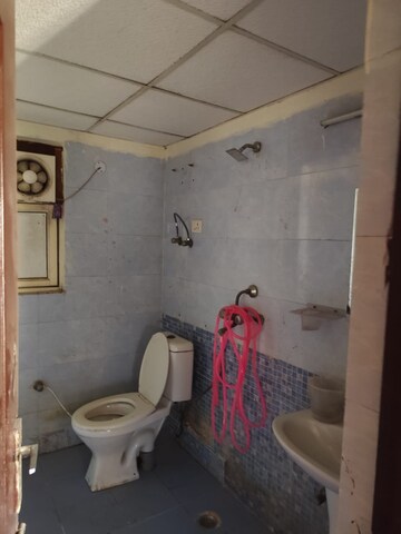 Bathroom in 3.5 BHK Apartment at Aims Golf City, Sector 75 – for Rent