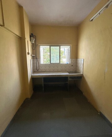 Kitchen in 1 BHK Apartment at Sawli CHS, Gorai 1 – for Sale