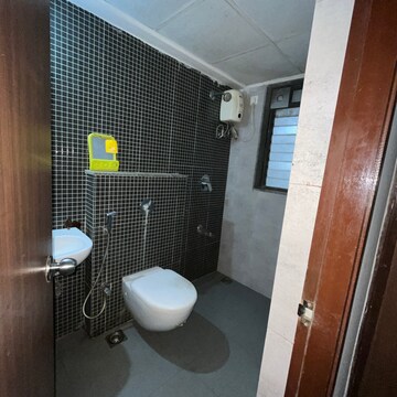 Bathroom in 2 BHK Apartment at Lodha Palava City Lakeshore Greens, Hedutane – for Rent