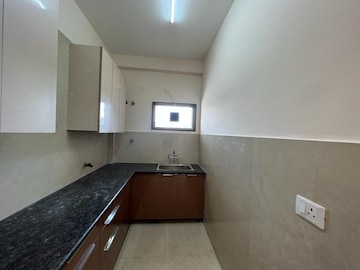 Kitchen in 1.5 BHK Apartment at DLF Garden Villas, Sector 43 – for Rent