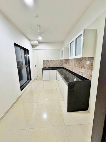 Kitchen in 2 BHK Apartment at Rajesh Raj Infinia, Malad West – for Rent