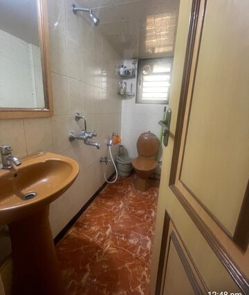 Bathroom in 3 BHK Apartment at Trishul CHS, Andheri West – for Rent
