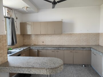 Kitchen in 3 BHK Apartment at Raheja Vedaanta, Sector 108 – for Rent