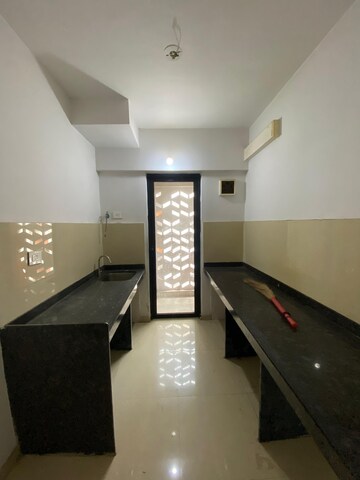 Kitchen in 1 BHK Apartment at Lodha Lakeshore Greens, Dombivli East – for Rent
