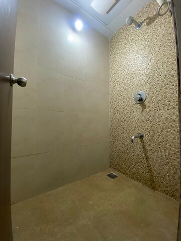 Bathroom in 1 BHK Apartment at Lodha Lakeshore Greens, Dombivli East – for Rent