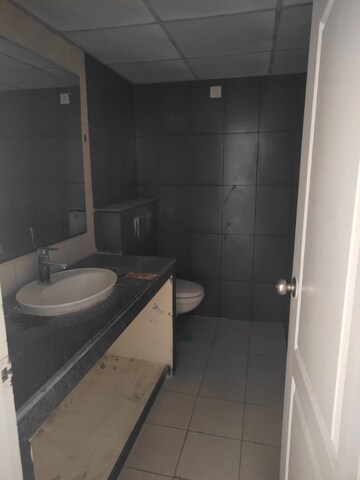 Bathroom in 3 BHK Apartment at Raheja Vedaanta, Sector 108 – for Rent