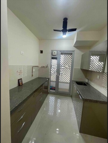 Kitchen in 3 BHK Apartment at Dosti West County, Balkum Pada – for Rent