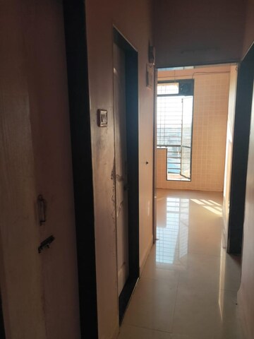 Building Lobby in 1 BHK Apartment at Kopar Khairane – for Rent