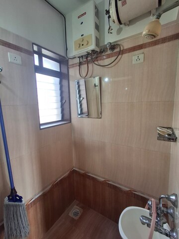 Bathroom in 3 BHK Apartment at Concrete Sai Sansar, Chembur – for Rent