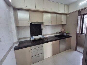 Kitchen in 3 BHK Apartment at Concrete Sai Sansar, Chembur – for Rent