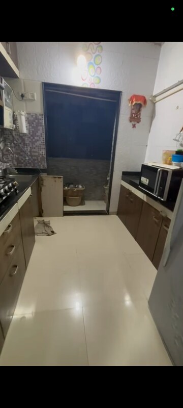 Kitchen in 2 BHK Apartment at Space Ashley Garden, Mira Road – for Sale