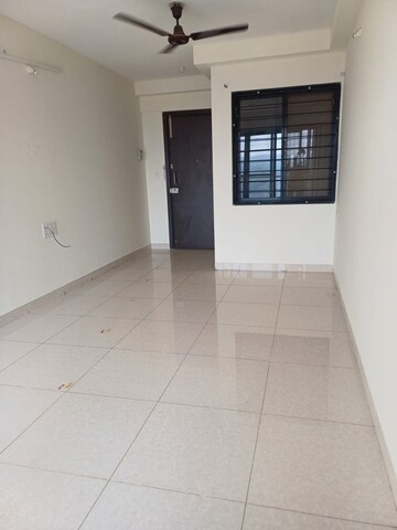 Living Room in 2 BHK Apartment at Magarpatta Nanded City Sargam, Sinhagad – for Sale