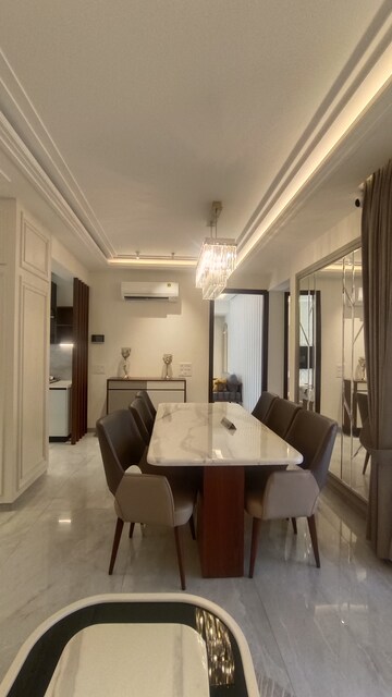 Living Room in 4 BHK Apartment at Dhakoli Village – for Sale