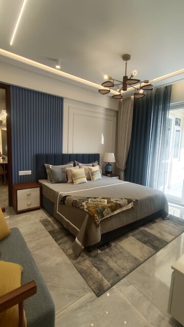 Bedroom in 4 BHK Apartment at Dhakoli Village – for Sale