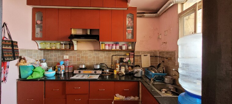 Kitchen, antriksh-green-kaushambi 2 Bedroom 1300 Sq.Ft. Apartment In Dabur Chowk Ghaziabad 8363005