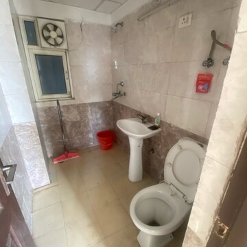 Bathroom in 2 BHK Apartment at Aims Golf City, Noida Central – for Rent