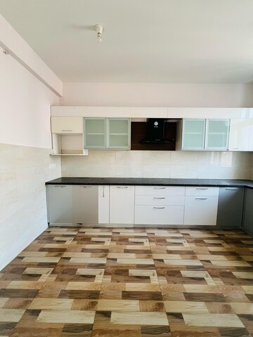 Kitchen in 4 BHK Apartment at Chandra Panorama, Sushant Golf City – for Sale