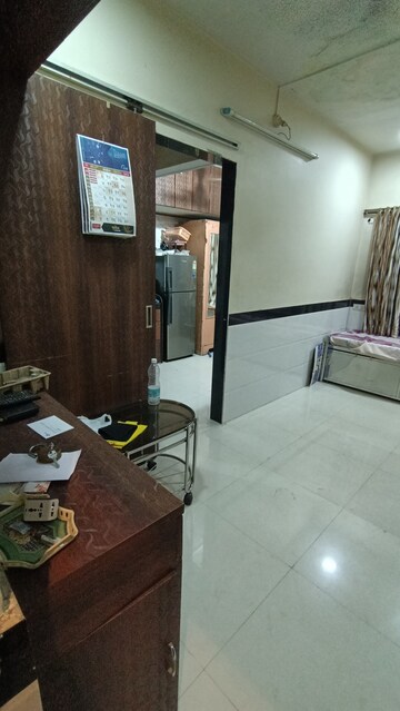 Living Room in 1 RK Apartment at Maitri Murti Apartment, Santacruz East – for Rent