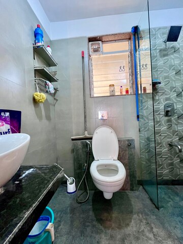 Bathroom in 3 BHK Apartment at Paradise Lifespaces Sai World City, New Panvel – for Rent