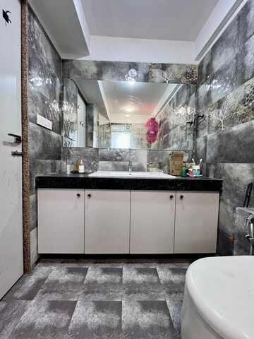 Bathroom in 3 BHK Apartment at Paradise Lifespaces Sai World City, New Panvel – for Rent