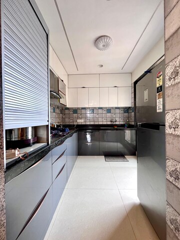 Kitchen in 3 BHK Apartment at Paradise Lifespaces Sai World City, New Panvel – for Rent