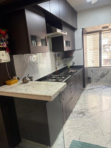 Kitchen in 2 BHK Apartment at Goyal Green Woods, Andheri East – for Rent