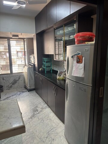 Kitchen in 2 BHK Apartment at Goyal Green Woods, Andheri East – for Rent