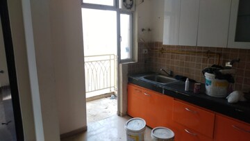 Kitchen in 3 BHK Apartment at Mahagun Mywoods, Sector 16c Greater Noida – for Rent