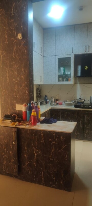 Kitchen in 3 BHK Apartment at Mahagun Mywoods, Sector 16c Greater Noida – for Rent