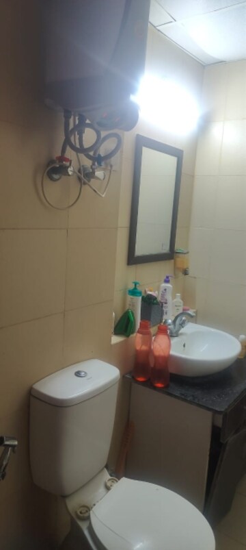 Bathroom in 3 BHK Apartment at Mahagun Mywoods, Sector 16c Greater Noida – for Rent