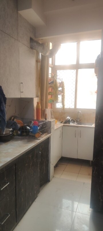 Kitchen in 3 BHK Apartment at Mahagun Mywoods, Sector 16c Greater Noida – for Rent