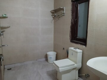 Bathroom in 3 BHK Builder Floor at Freedom Fighters Enclave – for Rent