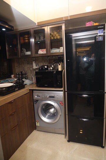 Kitchen in 2 BHK Apartment at Chanchal Kalyan Complex, Yari Road – for Rent