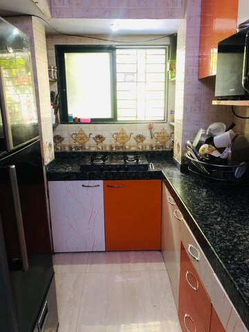 Kitchen in 2 BHK Apartment at Sunrise CHS Vashi, Sector 28 – for Rent