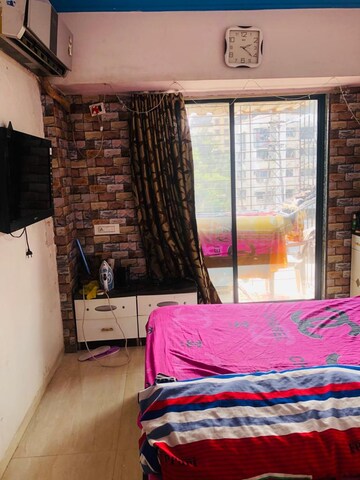 Bedroom in 2 BHK Apartment at Sunrise CHS Vashi, Sector 28 – for Rent