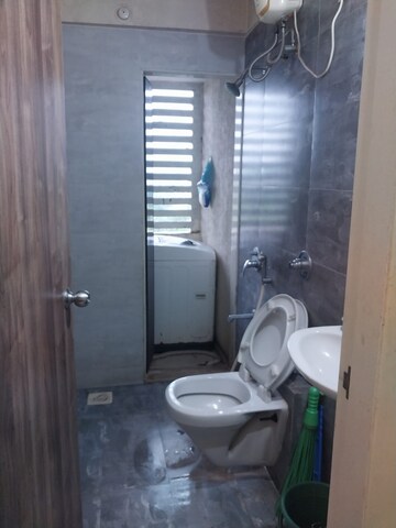 Bathroom in 2 BHK Apartment at Vishesh Balaji Symphony, New Panvel – for Rent