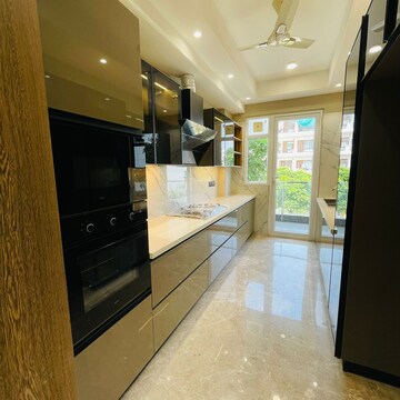 Kitchen in 4 BHK Builder Floor at Ansal API Esencia, Sector 67 – for Sale