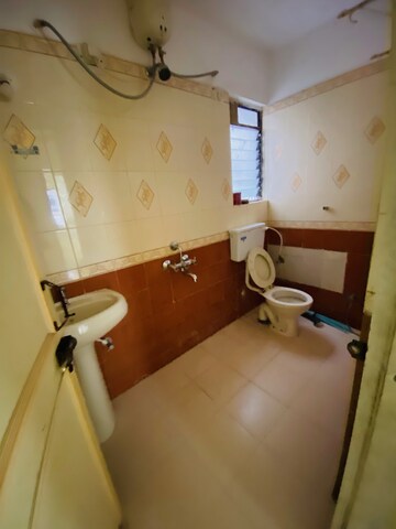 Bathroom in 2 BHK Apartment at Sunflower Apartment CHS, Kondhwa – for Rent