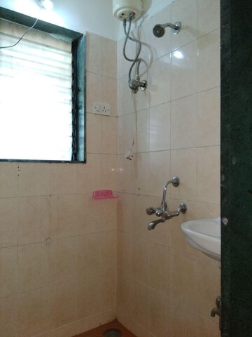 Bathroom in 1 BHK Apartment at Gayatri Corner, Kandivali East – for Rent