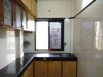 Kitchen in 1 BHK Apartment at Gayatri Corner, Kandivali East – for Rent