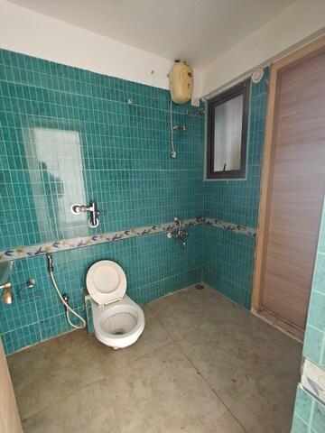 Bathroom in 4 BHK Apartment at Vanashree CHS, Seawoods – for Rent