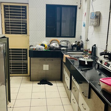 Kitchen in 2 BHK Apartment at Vishwendu Apartment, Senapati Bapat Road – for Rent