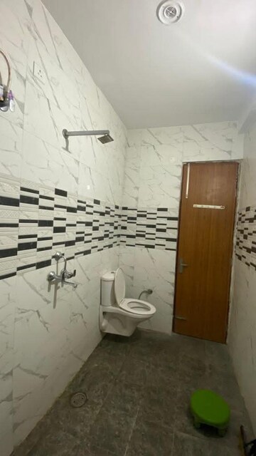 Bathroom in 3 BHK Apartment at Ansal API Victoria Floors, Dhakoli Village – for Rent