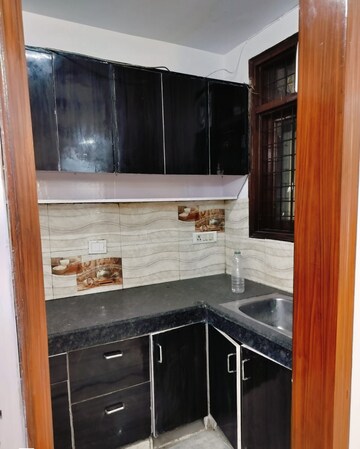 Kitchen in 2 BHK Builder Floor at Khirki Extension – for Rent