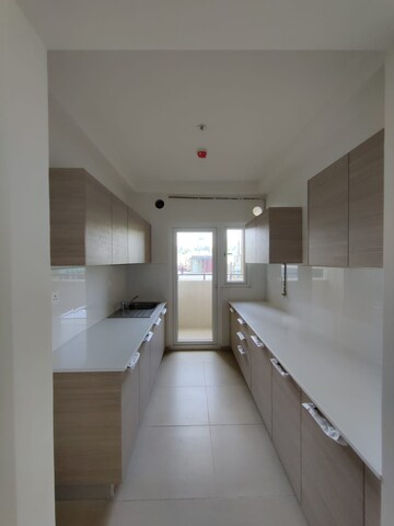 Kitchen in 1.5 BHK Apartment at Bhartiya Nikoo Homes Phase 2, Thanisandra Main Road – for Rent