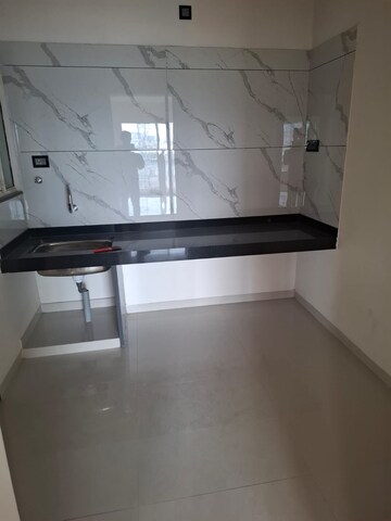 Kitchen in 2 BHK Apartment at Kolte Patil R10, Hinjewadi – for Rent